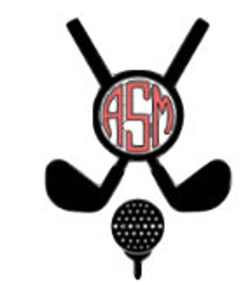 May include: Black and white graphic of crossed golf clubs with a golf ball on a tee. A circular emblem in the center features the initials "ASM" in a red, stylized font, surrounded by a black border.
