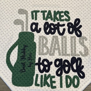 May include: White golf towel with the text "IT TAKES a lot of BALLS to golf LIKE I DO". The towel features a green golf bag with golf clubs and the text "Best Hubby by Pam".