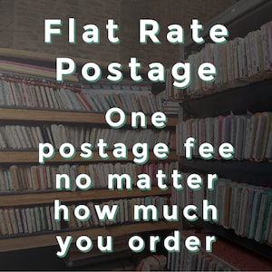May include: A sign with the text "Flat Rate Postage" and "One postage fee no matter how much you order" in front of a wall of fabric scraps.