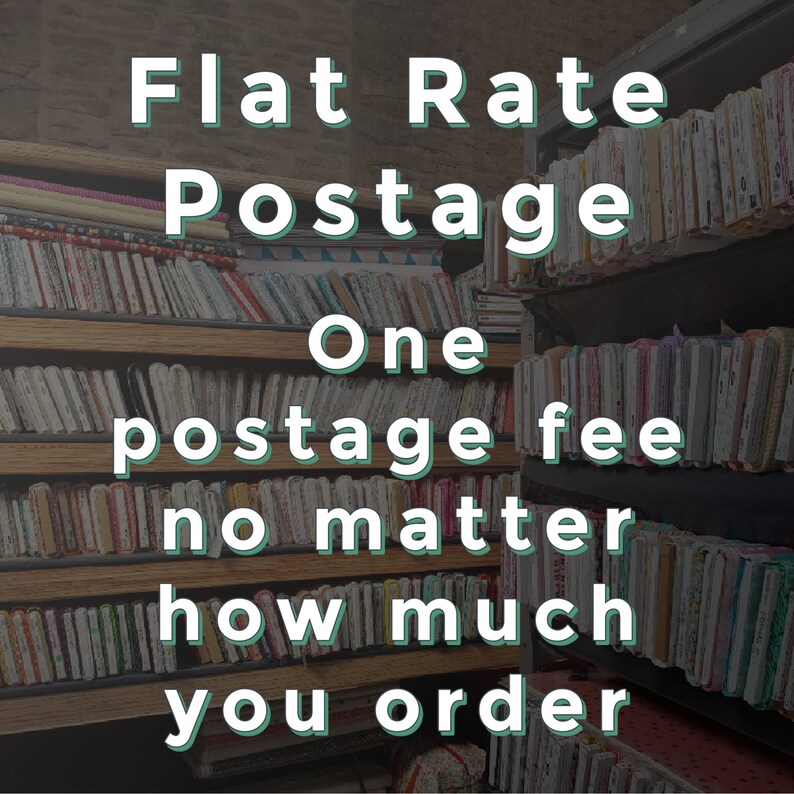 May include: A sign with the text "Flat Rate Postage" and "One postage fee no matter how much you order" in front of a bookshelf filled with colorful fabric scraps.