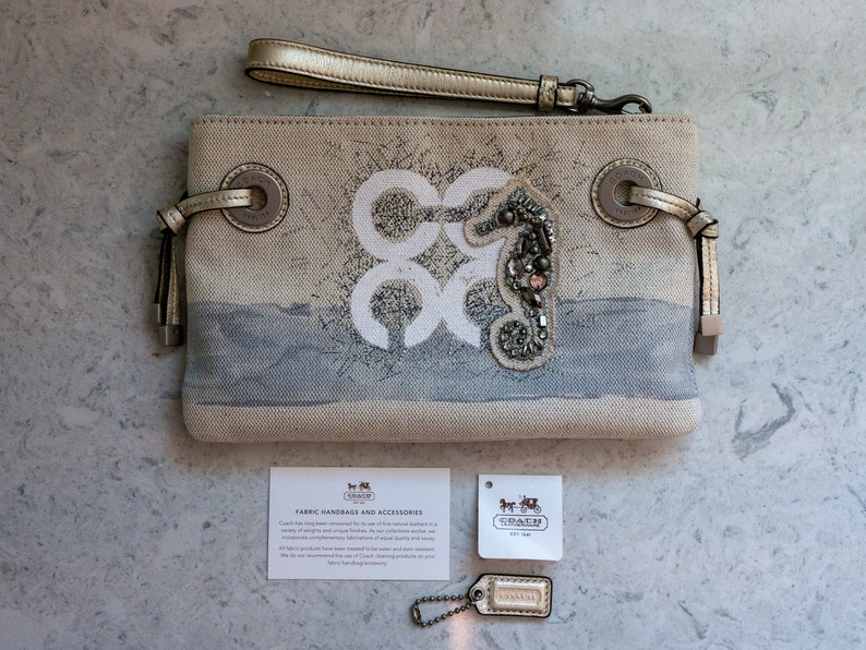 Coach Audrey Seahorse Canvas Wristlet Large Natural, Silver Like New, Excellent Condition image 3