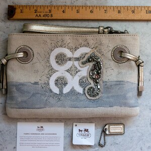 Coach Audrey Seahorse Canvas Wristlet Large Natural, Silver Like New, Excellent Condition image 4