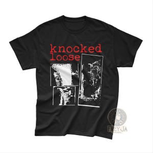 May include: Black t-shirt with the words "knocked loose" in red block letters. The shirt features a graphic design with four white and black images. The Frey-Ja Apparel logo is in the lower right corner.