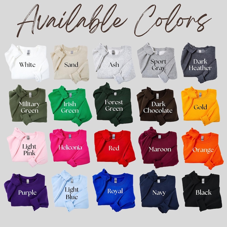 Puede incluir: Una exhibici&oacute;n de sudaderas en varios colores, incluyendo blanco, arena, ceniza y gris oscuro. El texto "Available Colors" est&aacute; en la parte superior. Otros colores incluyen verde militar, verde irland&eacute;s, verde bosque, chocolate negro, dorado, rosa claro, heliconia, rojo, granate, naranja, morado, azul claro, real, marino y negro.