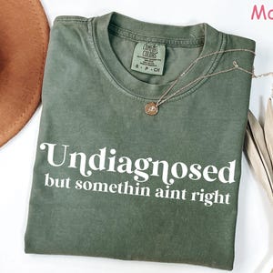 Comfort Colors® Funny Mental Health Shirt for Women, Undiagnosed But Something Ain&#39;t Right, Sarcastic Shirt, Anxiety Shirt, Funny Saying Tee