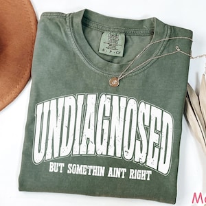 Comfort Colors® Funny Mental Health Shirt for Women, Undiagnosed But Something Ain&#39;t Right, Sarcastic Shirt, Anxiety Shirt, Funny Saying Tee