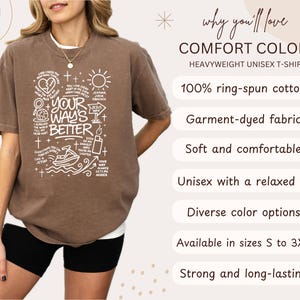 Op de afbeelding: Een bruin, zwaar unisex T-shirt met de witte tekst "Your Way's Better" en religieuze symbolen. Gemaakt van 100% ringgesponnen katoen, met een relaxte pasvorm. Verkrijgbaar in maten S tot 3XL. Het shirt is geverfd.