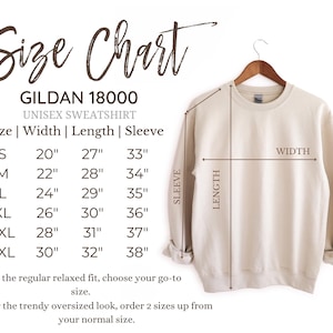 Puede incluir: Sudadera unisex Gildan 18000 beige con una tabla de tallas. La tabla muestra medidas en pulgadas (S: 51cm x 69cm x 84cm a 3XL: 76cm x 81cm x 97cm) para ancho, largo y largo de manga.