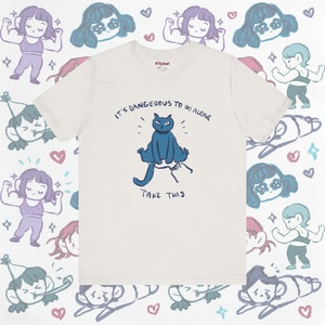 Het is gevaarlijk om alleen te gaan Grappige kattent-shirt | Leuk cadeau voor kattenliefhebbers | Kawaii T-shirt voor huisdiereigenaren