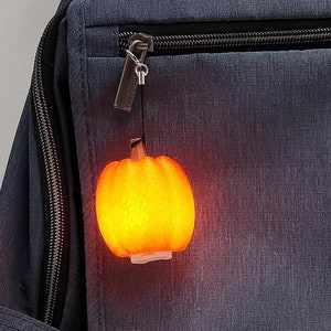 Festive Pumpkin Keychain Light for Trick-or-Treat Safety and Fun