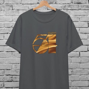 May include: A charcoal grey t-shirt with a gold graphic of the number 54 with the word "STUDIO" above it.