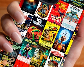 May include: A white phone case with a collage of vintage science fiction movie posters. The posters feature titles like "War of the Worlds", "The Time Machine", "The Blob", and "The Fly".