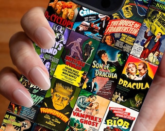 May include: A black iPhone case with a collage of vintage horror movie posters. The posters feature classic monsters like Dracula, Frankenstein, and the Wolfman. The case has a cutout for the camera lens.