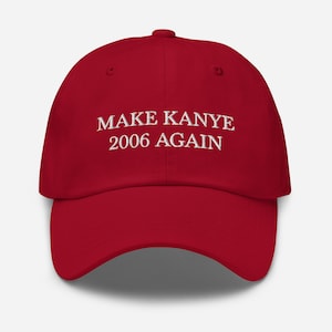 Peut inclure: Casquette de baseball rouge avec un texte brodé en blanc qui dit "MAKE KANYE 2006 AGAIN".
