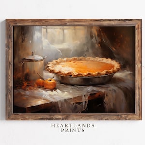 May include: A rustic wooden framed print of a still life featuring a pumpkin pie, two small pumpkins, and a silver pitcher on a wooden table with a white tablecloth.