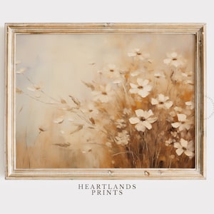 May include: A framed painting of a bouquet of white flowers with brown stems against a beige background.