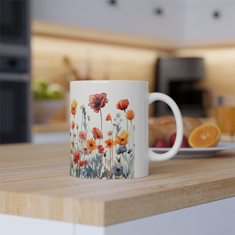 a coffee mug sitting on top of a wooden counter