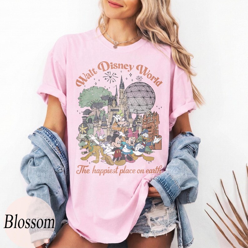 May include: A white ceramic mug with a black handle and the text "But First, Coffee" in a black, bold font. The mug is on a white surface. The mug is approximately 4 inches tall.