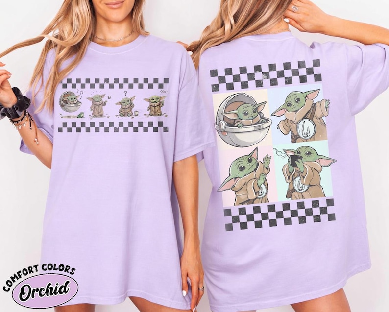 May include: A light purple t-shirt featuring a cartoon character in various poses, with a black and white checkered pattern. The shirt has the text "COMFORT COLORS Orchid" in a circular design.