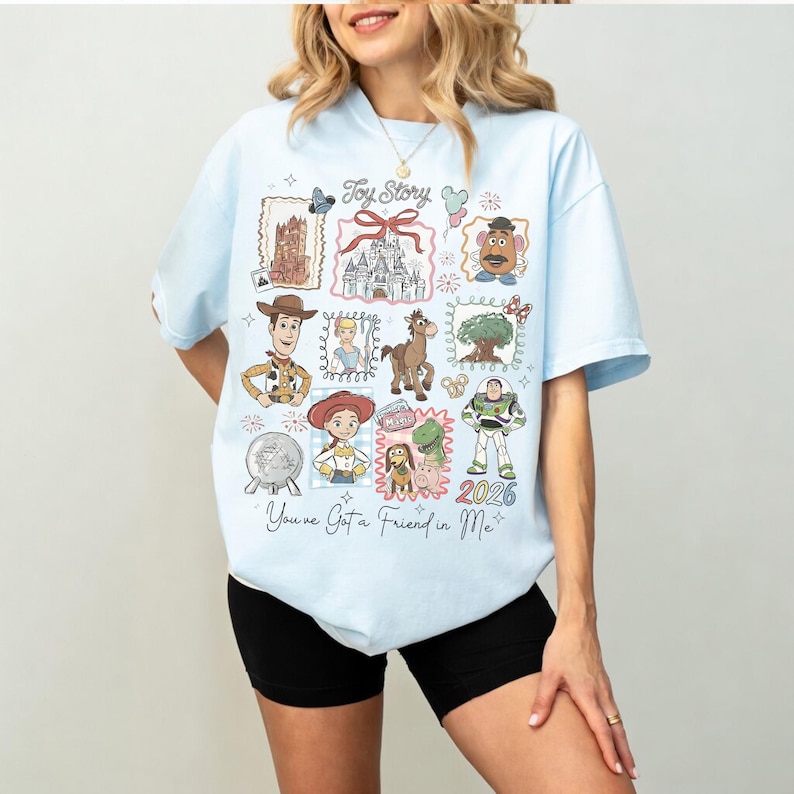 Camiseta Comfort Color® Retro "Tienes un amigo en mí" de Toy Story, Camiseta de Toy Story, Camiseta de Woody y Buzz para la fiesta de Toy Story 2026, Camiseta de Disney Pixar Chambray/Light Blue