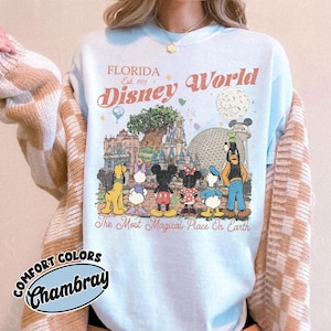 May include: A set of three ceramic mugs with a speckled, matte finish in cream, light grey, and dark grey. Each mug has a simple, minimalist design, suitable for coffee or tea.