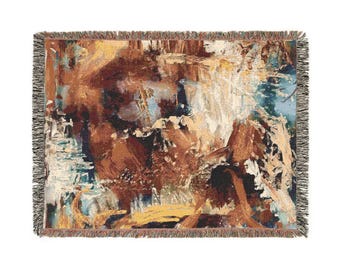 May include: Abstract tapestry throw blanket with a brown, blue, and yellow color scheme. The design features a variety of abstract shapes and patterns.