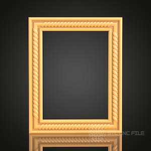 May include: A wooden picture frame with a rope-like design around the edge. The frame is a light brown color and has a rectangular shape.