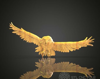 May include: A golden owl sculpture with its wings spread wide, as if in flight. The owl's eyes are open and its beak is closed. The sculpture is detailed and realistic, with feathers and talons visible. The sculpture is reflected in a black surface.