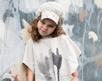 REVERSIBLE newsboy hat with brown plaid fabric brim and wood buttons; fits 8 - adult