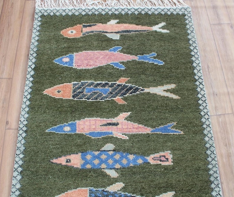 Koi wool runner with geometric border and fringe