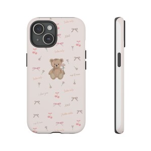 Coque rose pour iPhone 15, ours en peluche et ruban image 2