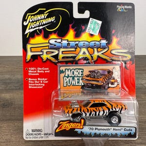 Johnny Lightning Zingers '70 Plymouth HEMI Cuda Die Cast Car 1:64 Scale MORE POWER Muscle Car Collectible