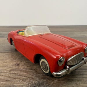 Vintage Red Austin Healey Toy Car: Collectible Diecast Model