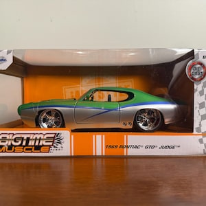 1969 Pontiac GTO Judge Diecast Car Jada 1:24 Scale Bigtime Muscle Series  Classic Muscle Car Collectible Model