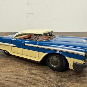 Vintage Cadillac Tin Car Made in Japan 6.5 Inch Lithograph Sedan Friction Toy Mid-Century Collectible