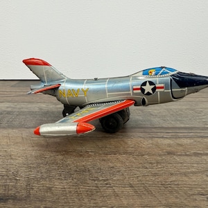 Vintage US Navy F-3H-2 Demon Tin Toy Jet – Made in Japan – 7&quot; Aircraft Collectible – 1950s Military Plane Toy