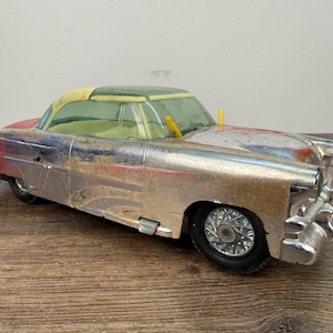 May include: A rustic wooden sign with the text "Welcome to our home" in white lettering. The sign features a distressed finish and a simple, inviting design, perfect for a front porch or entryway.