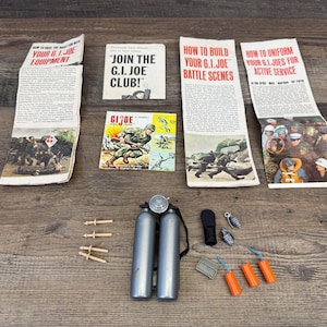 May include: A collection of vintage G.I. Joe accessories including four paper instruction manuals with text such as How to Have the Most Fun with Your G.I. Joe Equipment, Join the G.I. Joe Club, and How to Build Your G.I. Joe Battle Scenes.