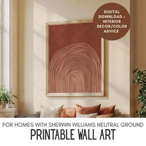 Op de afbeelding: Een ingelijste wandkunstprint met een terracotta-kleurige achtergrond met witte, met de hand getekende concentrische booglijnen. Een ronde bruine badge in de rechterbovenhoek bevat de tekst: DIGITAL DOWNLOAD + INTERIOR DECOR/COLOR ADVICE.