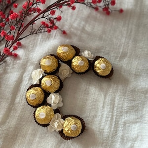 Eid Gift - Ramadan Gift: wooden crescent moon decorated with Ferrero Rocher chocolates & Flowers