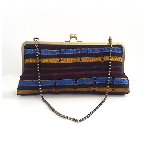 oversized gold clutch bag