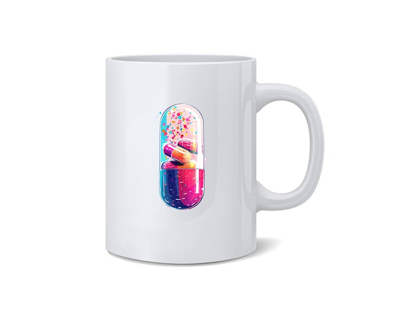 May include: White ceramic mug featuring a colourful illustration of a capsule filled with pills and a sprinkle of colourful dots.