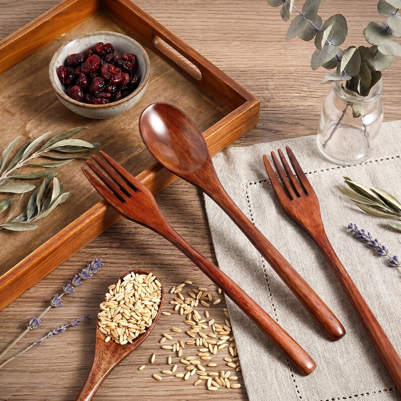 Eco friendly reusable wooden utensils for soup, rice bowls, desserts, and camping meals.