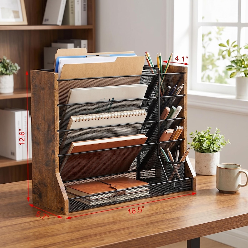 May include: A wooden desk organiser with multiple compartments for files, notebooks, and pens. The organiser is 41.9 cm wide, 32 cm tall, and 10.4 cm deep. It has a rustic, distressed finish and a black mesh design.
