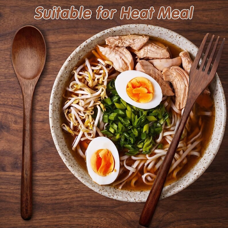Japanese inspired wooden dining utensils styled in a warm minimalist kitchen setting.