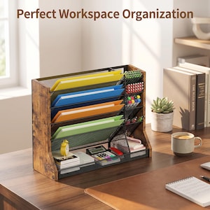 May include: A wooden desk organiser with multiple compartments for files, pens, and other office supplies. The organiser has a rustic wood finish and a black mesh design. The image also shows a calculator, notepad, and a small succulent plant.