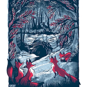May include: A blue and red illustration of three foxes looking up at a dark cave entrance in a forest. The foxes are red with white accents. The cave entrance is surrounded by blue and white foliage. The text "Cricket Press" is at the bottom of the image.