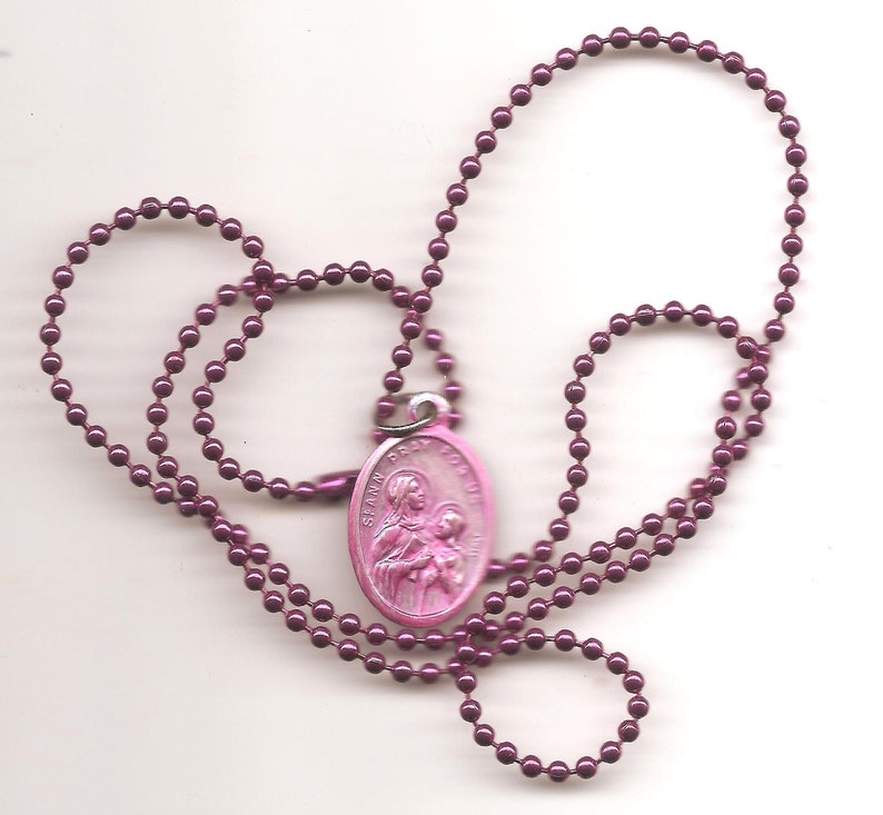 Seamstresses and Grandma's, Pink St Ann Patron Saint Medal on Raspberry