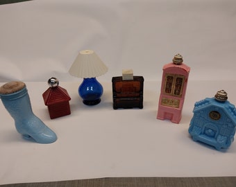 vintage weather vane, blue glass cuckoo clock, blue glass ladies boot, blue glass lamp, pink hutch& brown glass piano.