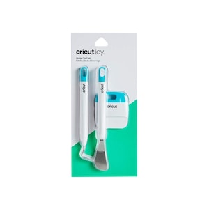 May include: A white and blue Cricut Joy Starter Tool Set packaging with three tools: a scraper, a weeding tool, and a scraper with a blue handle. The packaging has the text "Cricut Joy" and "Starter Tool Set" printed on it.